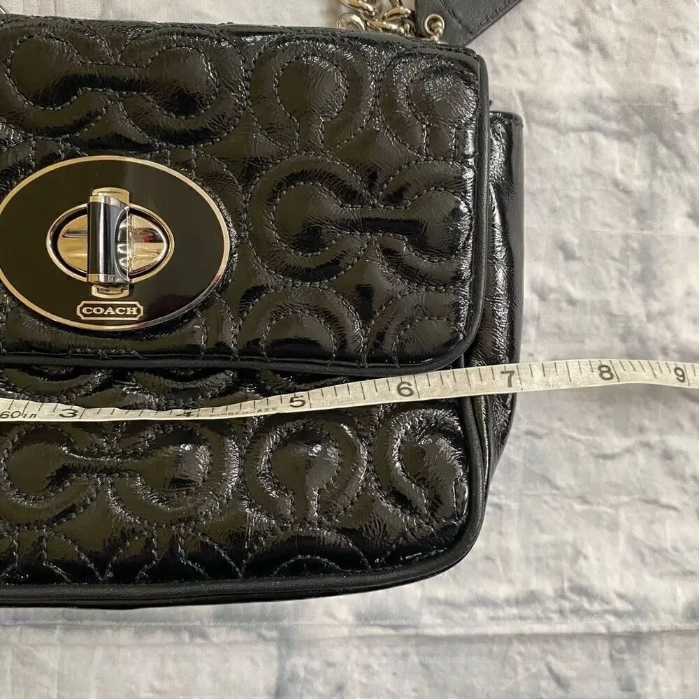 Coach mini shoulder/crossbody bag w/twist latch closure w/satin inner lining